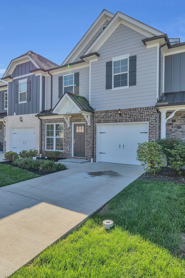 view of front of property featuring a garage and a front yard