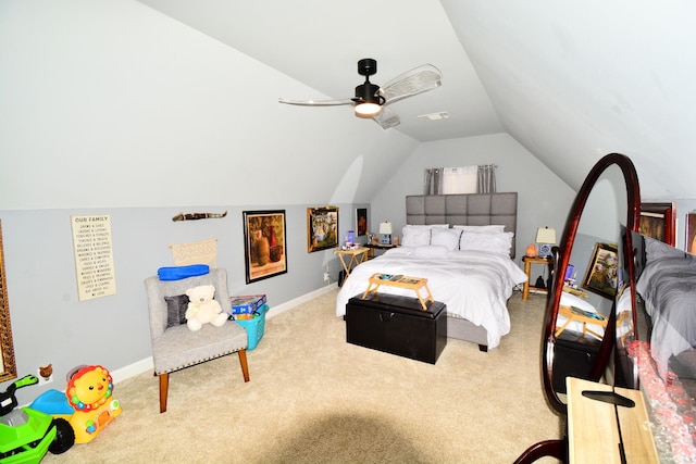 carpeted bedroom featuring vaulted ceiling and ceiling fan