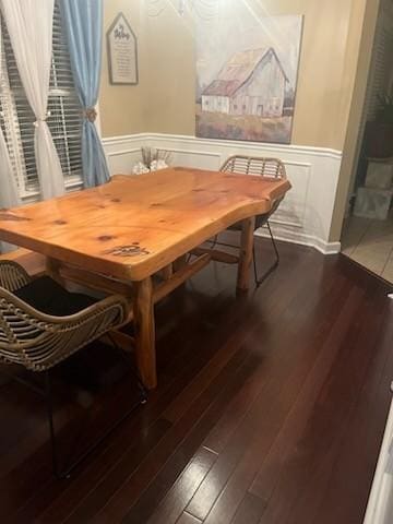 dining space featuring dark hardwood / wood-style floors