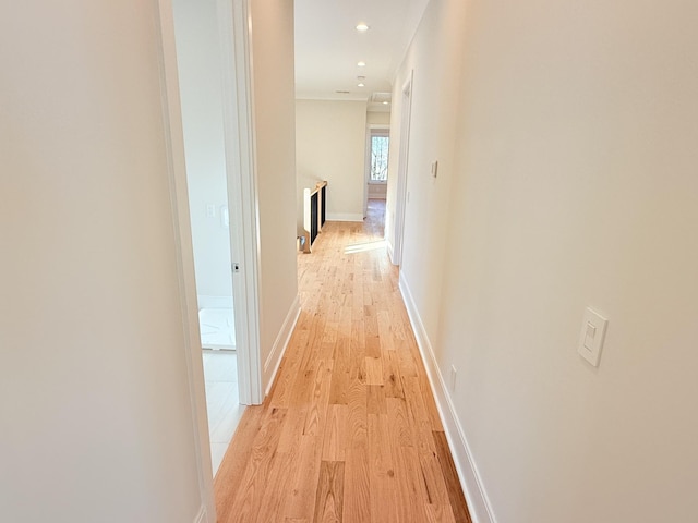 hallway with light wood-type flooring