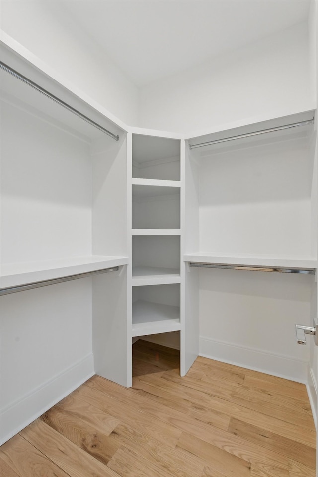 walk in closet featuring light wood-type flooring