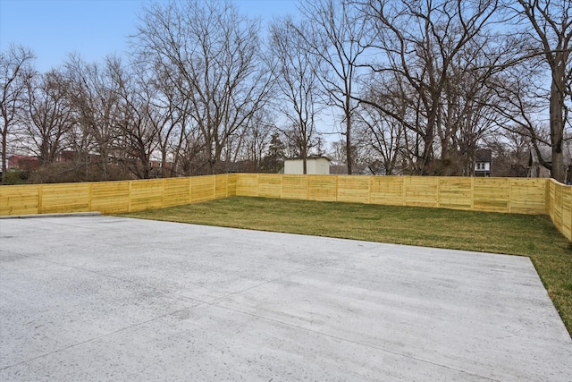 view of yard with a fenced backyard