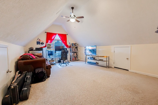 interior space with carpet, lofted ceiling, and a textured ceiling