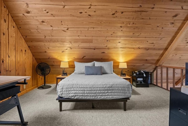 carpeted bedroom with lofted ceiling, wooden walls, and wooden ceiling