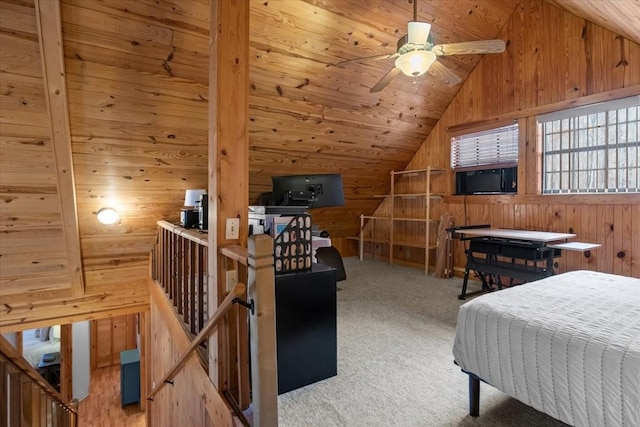 bedroom featuring wood ceiling, vaulted ceiling, carpet, and wood walls