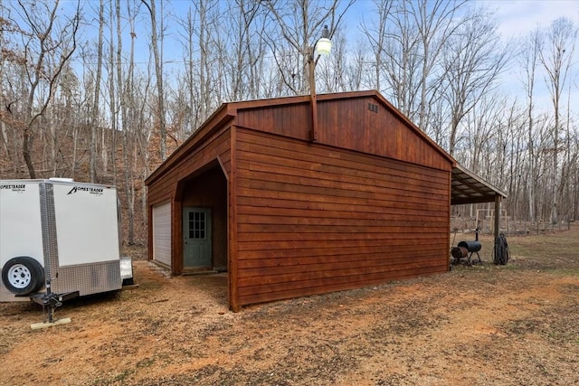 view of outdoor structure with a garage