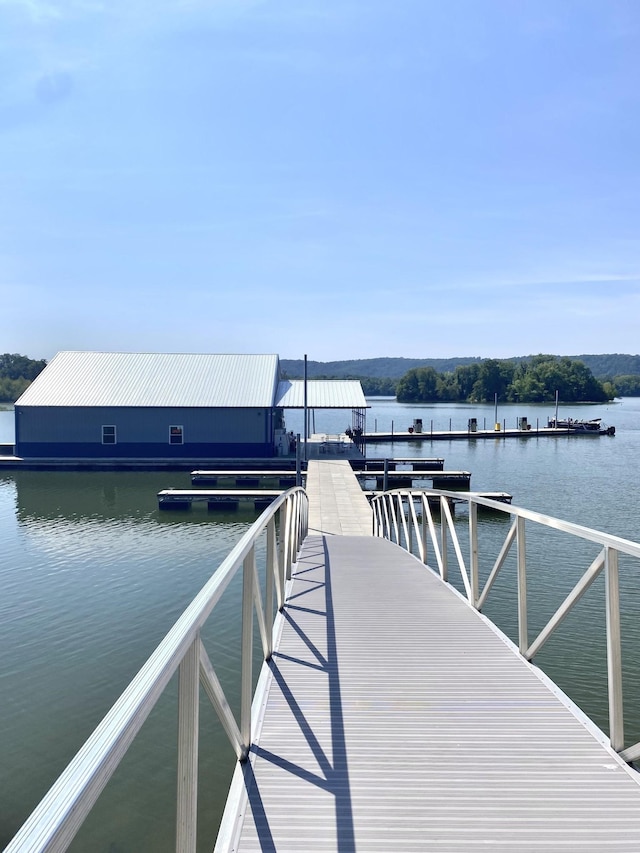 dock area featuring a water view