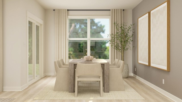 dining room with light hardwood / wood-style floors