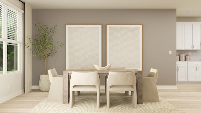 dining room with light wood-type flooring