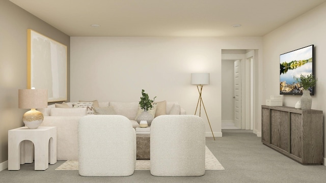 living area with light colored carpet