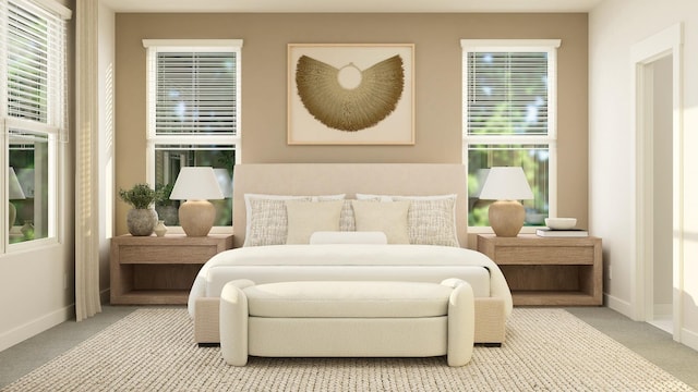 bedroom featuring light carpet and multiple windows