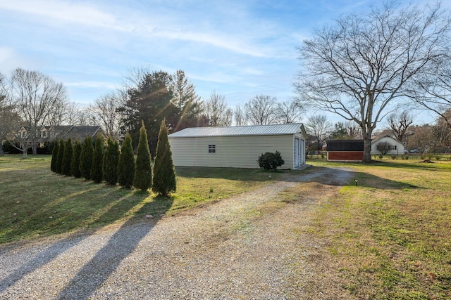 garage with a lawn