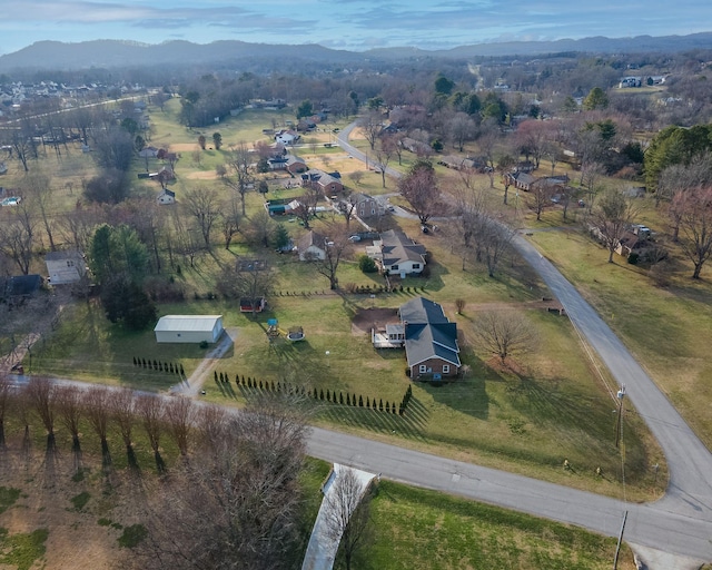 aerial view featuring a rural view and a mountain view