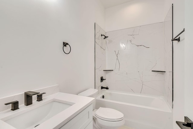 full bathroom with vanity, toilet, and tiled shower / bath