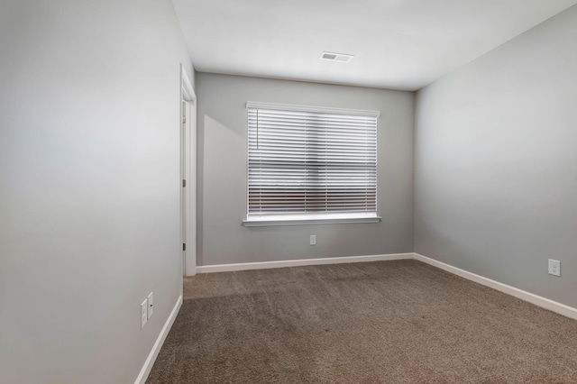 view of carpeted spare room