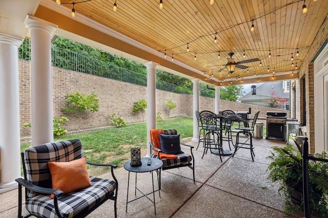 view of patio featuring a grill and ceiling fan