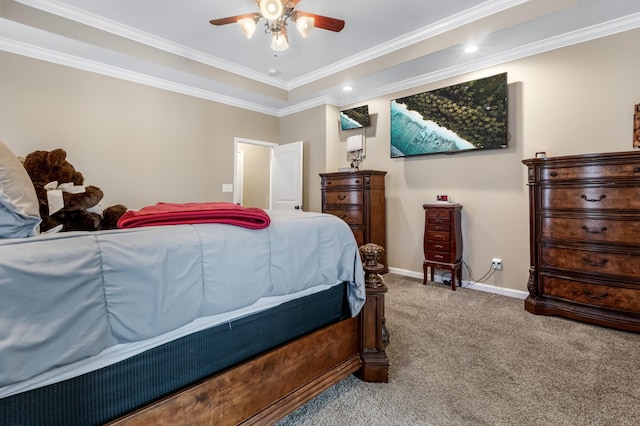 carpeted bedroom featuring ornamental molding and ceiling fan