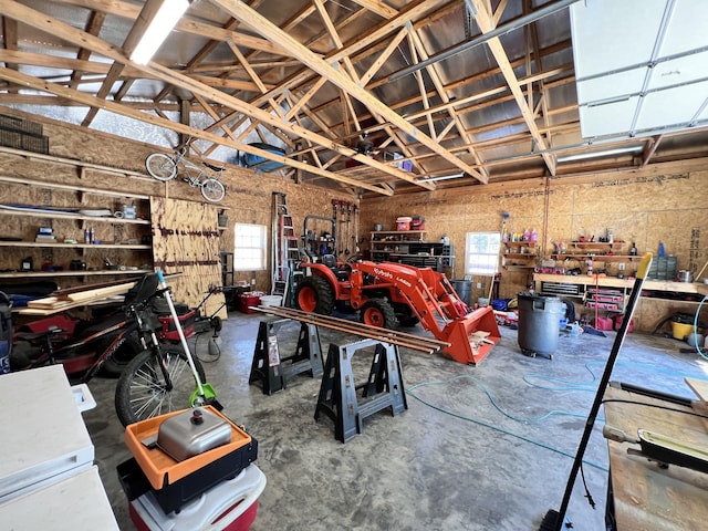 garage with a workshop area