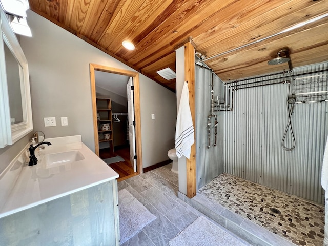 bathroom with wood ceiling, vanity, a shower, vaulted ceiling, and toilet