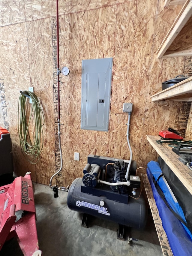 utility room featuring electric panel