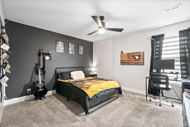 bedroom with ceiling fan and carpet