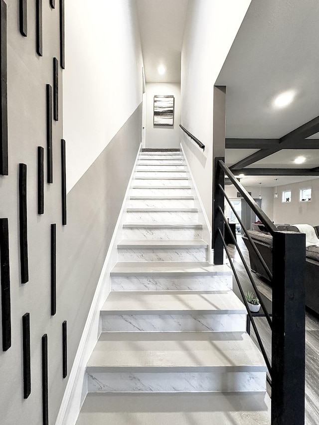 stairs with wood-type flooring