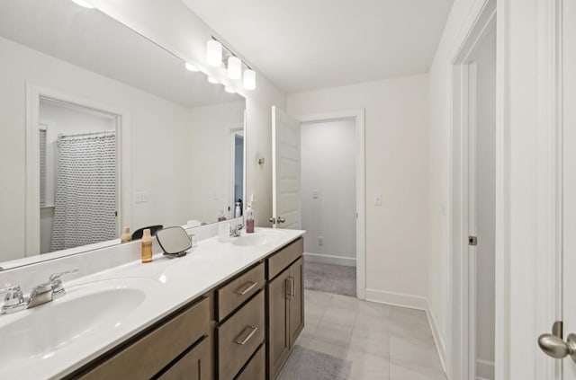 bathroom featuring vanity and tile patterned flooring