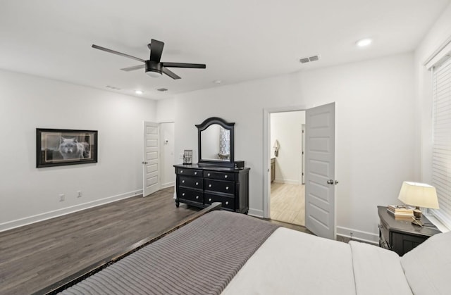 bedroom featuring ceiling fan and dark hardwood / wood-style flooring