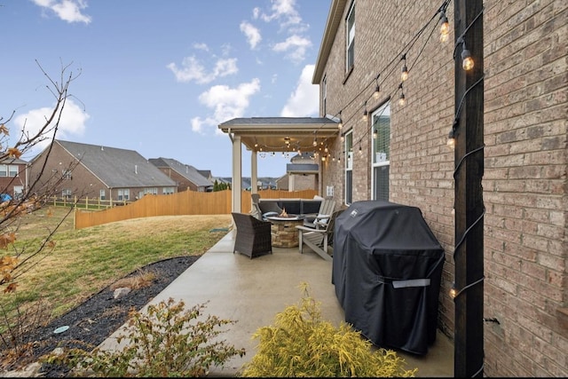 view of patio / terrace featuring an outdoor living space and a grill