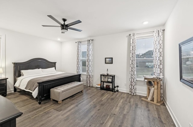 bedroom featuring dark hardwood / wood-style floors and ceiling fan