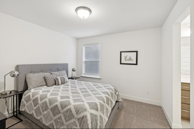 bedroom with light carpet