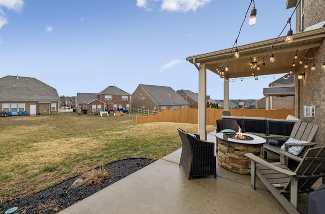 view of patio with an outdoor fire pit