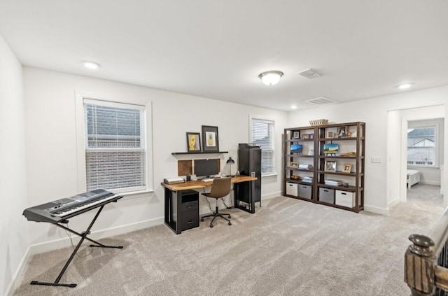 view of carpeted office space