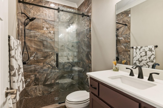 bathroom with walk in shower, vanity, and toilet