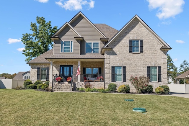 craftsman-style house with a porch and a front yard