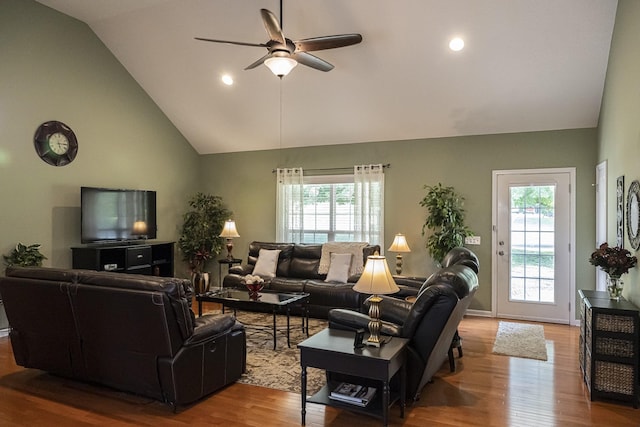 living room featuring high vaulted ceiling, plenty of natural light, hardwood / wood-style floors, and ceiling fan