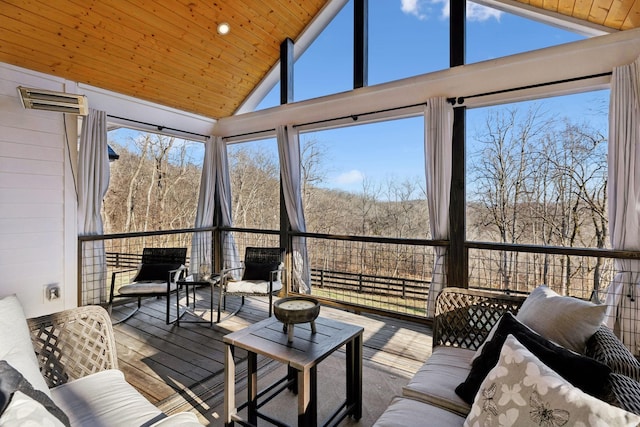 sunroom / solarium with lofted ceiling and wood ceiling