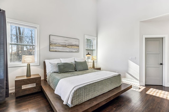 bedroom featuring dark hardwood / wood-style floors