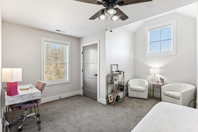 bedroom with vaulted ceiling, light colored carpet, and ceiling fan