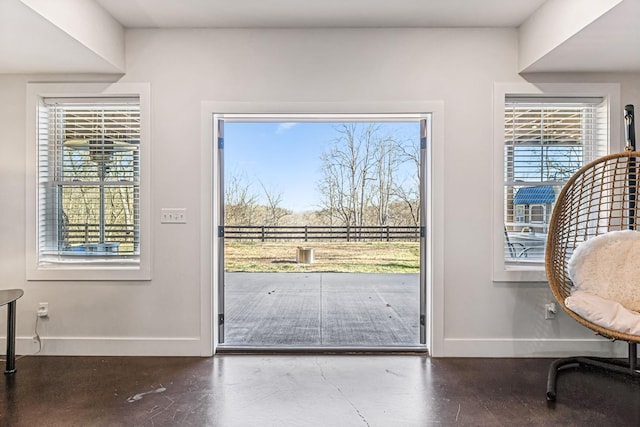 doorway featuring concrete floors