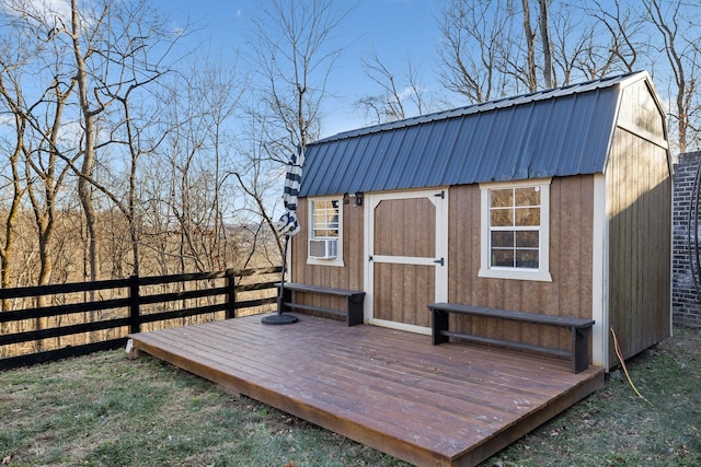 deck featuring a storage unit