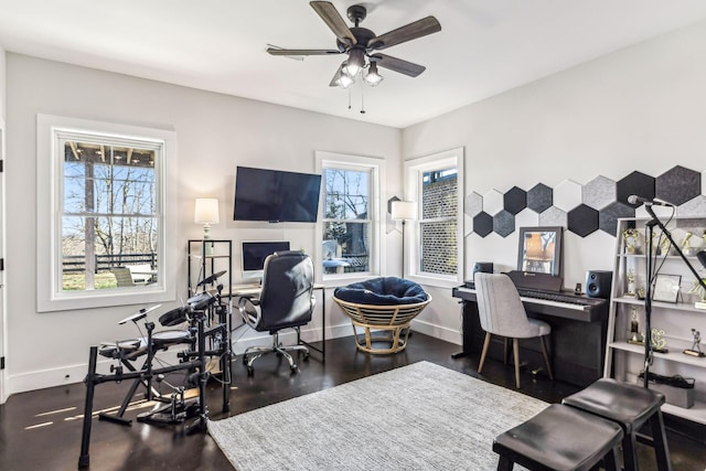 office featuring dark hardwood / wood-style floors and ceiling fan