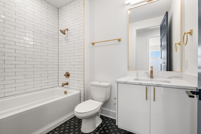 full bathroom featuring vanity, toilet, tiled shower / bath combo, and tile patterned flooring