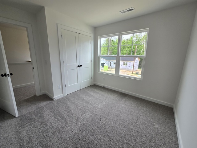 2391 Nelson Way, Cookeville, TN 38506 - unfurnished bedroom with carpet, baseboards, and a closet
