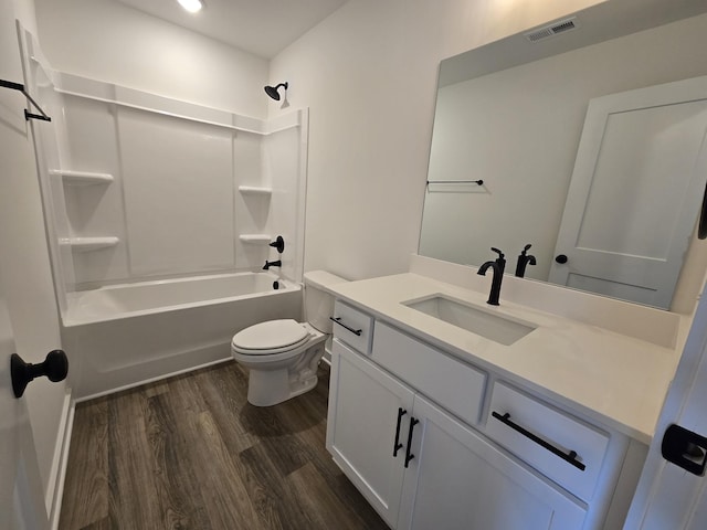 2391 Nelson Way, Cookeville, TN 38506 - bathroom featuring wood finished floors, vanity, toilet, and shower / washtub combination