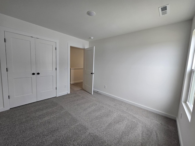 2391 Nelson Way, Cookeville, TN 38506 - unfurnished bedroom with carpet floors, baseboards, and a closet