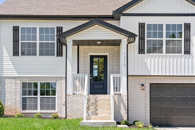 property entrance with a garage