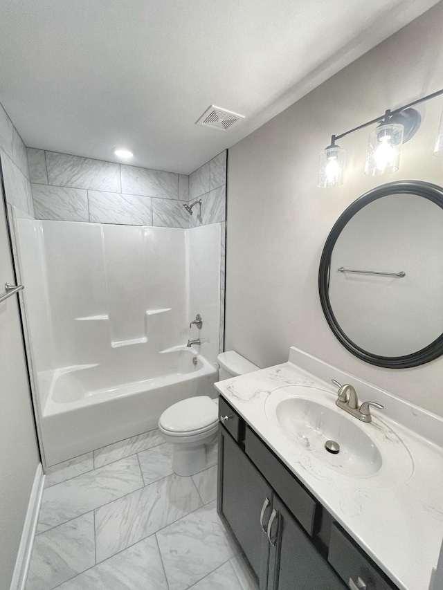 full bathroom with toilet, vanity, and  shower combination