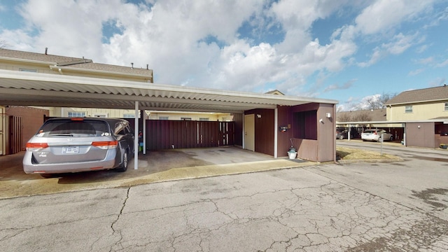 view of parking featuring a carport