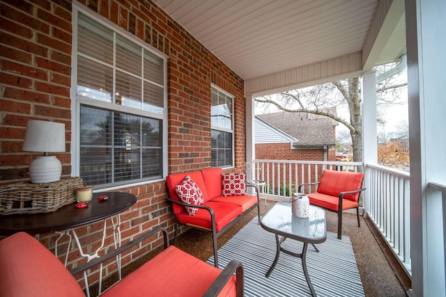 wooden terrace featuring a porch